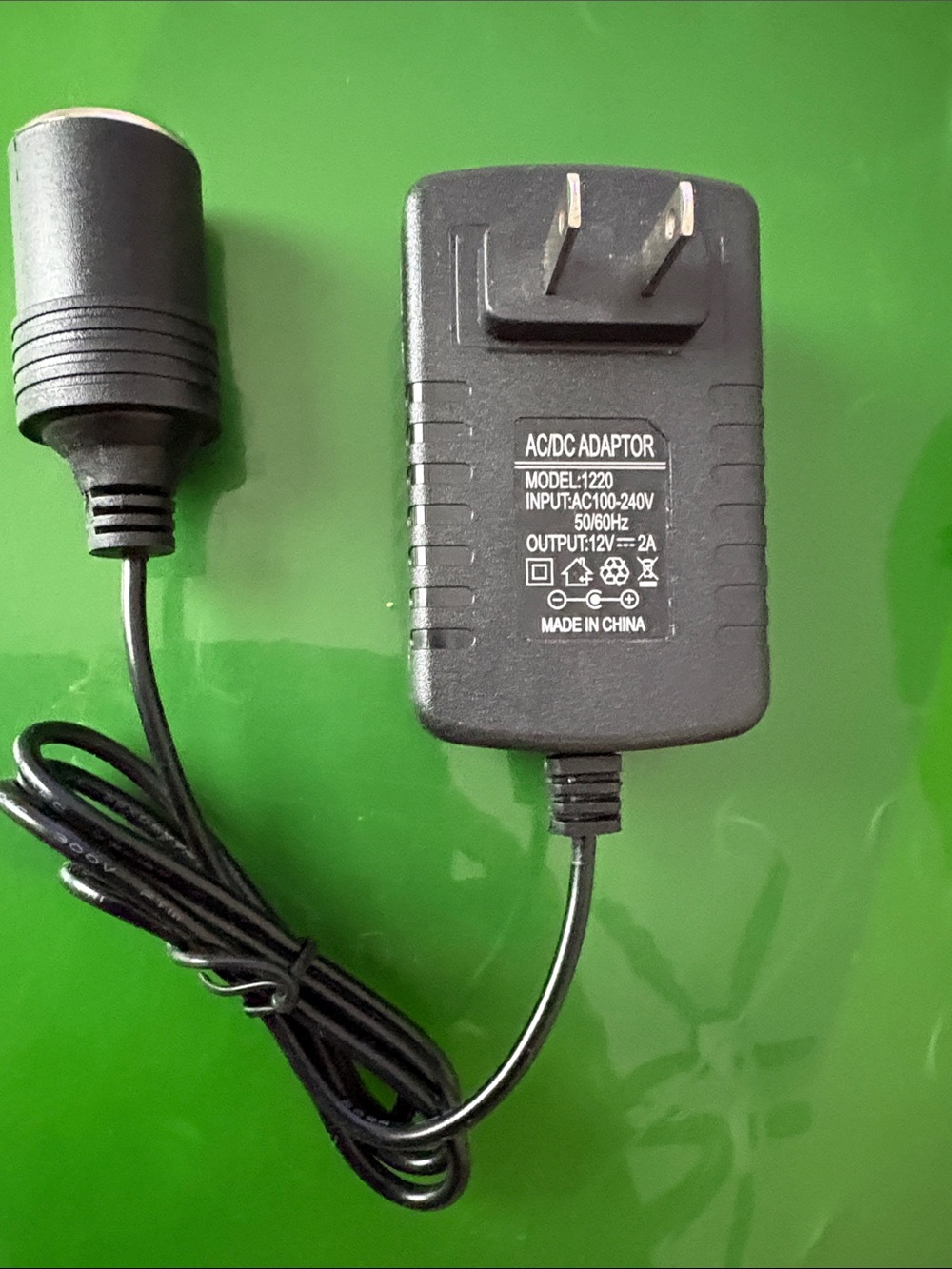 Source Unknown Black AC/DC Adapter 12V 2A